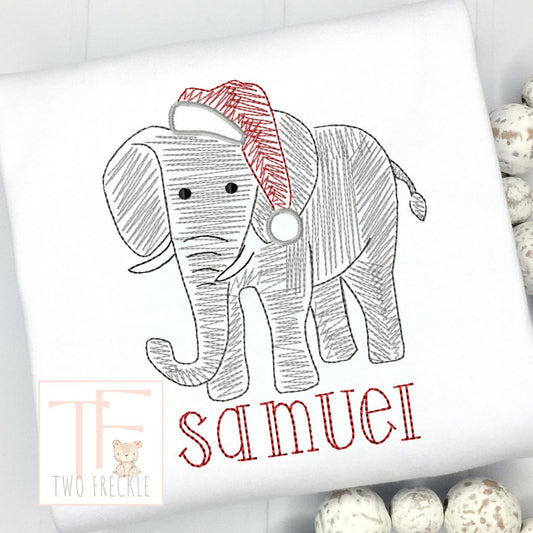 an elephant with a santa hat on it's head